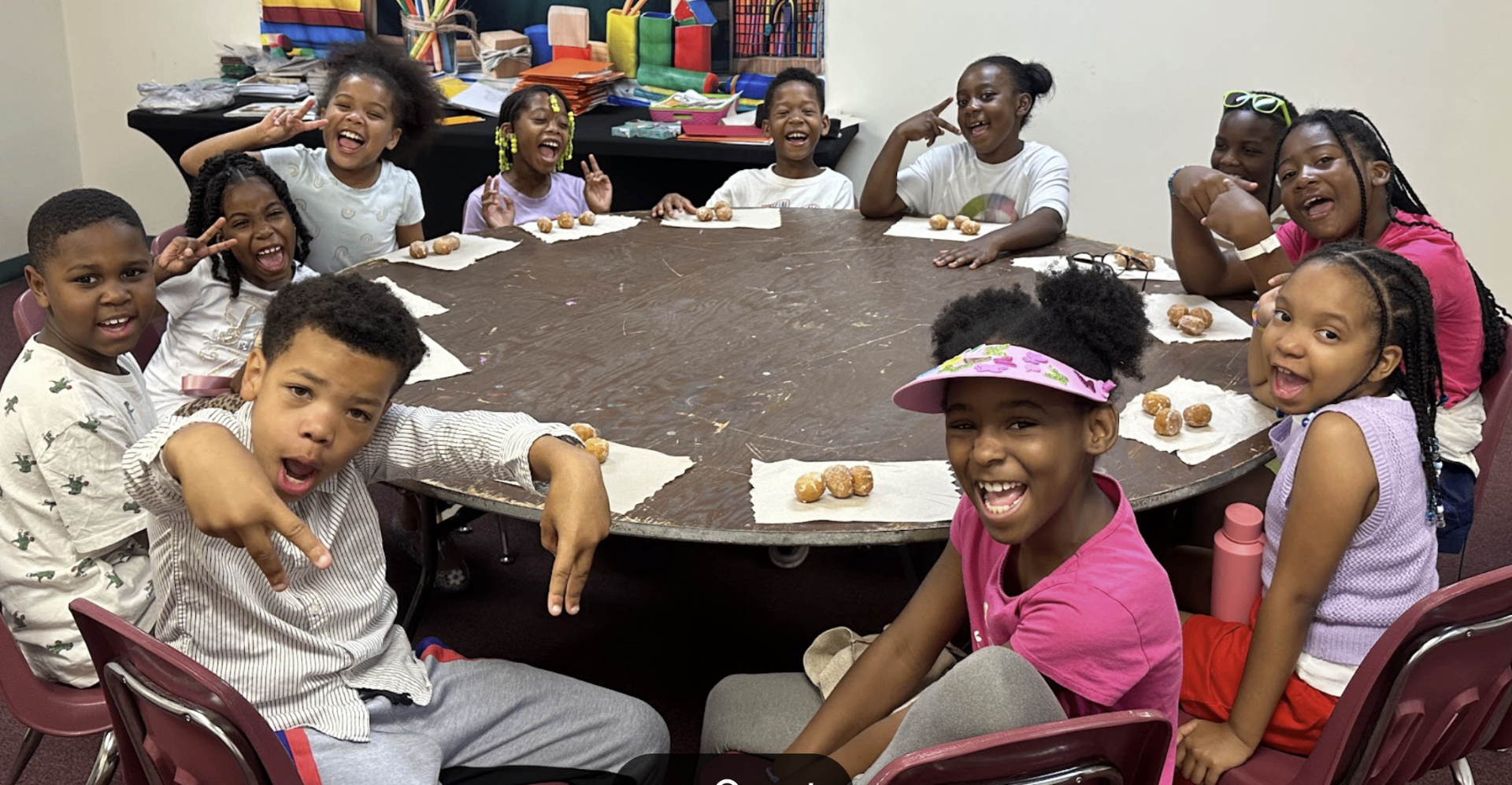 Group of campers enjoying snack time together